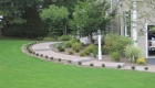 1-Belgard walkway with contrasting edge, granite steps and circle detail (1)