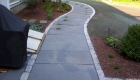 12-Formal bluestone patio with granite cobble edging (1)