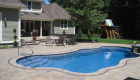 22-Unilock-Beacon-Hill-Flagstone,-copthorn-inlay,-bullnose-pool-coping-and-stone-veneered-spa-(2)