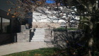 50-Unilock Umbriano pavers with Estate wall. Granite steps, under cap lighting, planting and firepit (2)