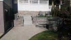 52-Unilock Umbriano pavers with Estate wall. Granite steps, under cap lighting, planting and firepit (4)