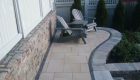 54-Unilock Umbriano pavers with Estate wall. Granite steps, under cap lighting, planting and firepit (6)