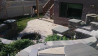 56-Unilock Umbriano pavers with Estate wall. Granite steps, under cap lighting, planting and firepit (8)