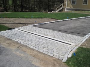 Granite cobble apron with drainage (1)