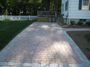 Pavestone pavers with granite cobble apron (1)